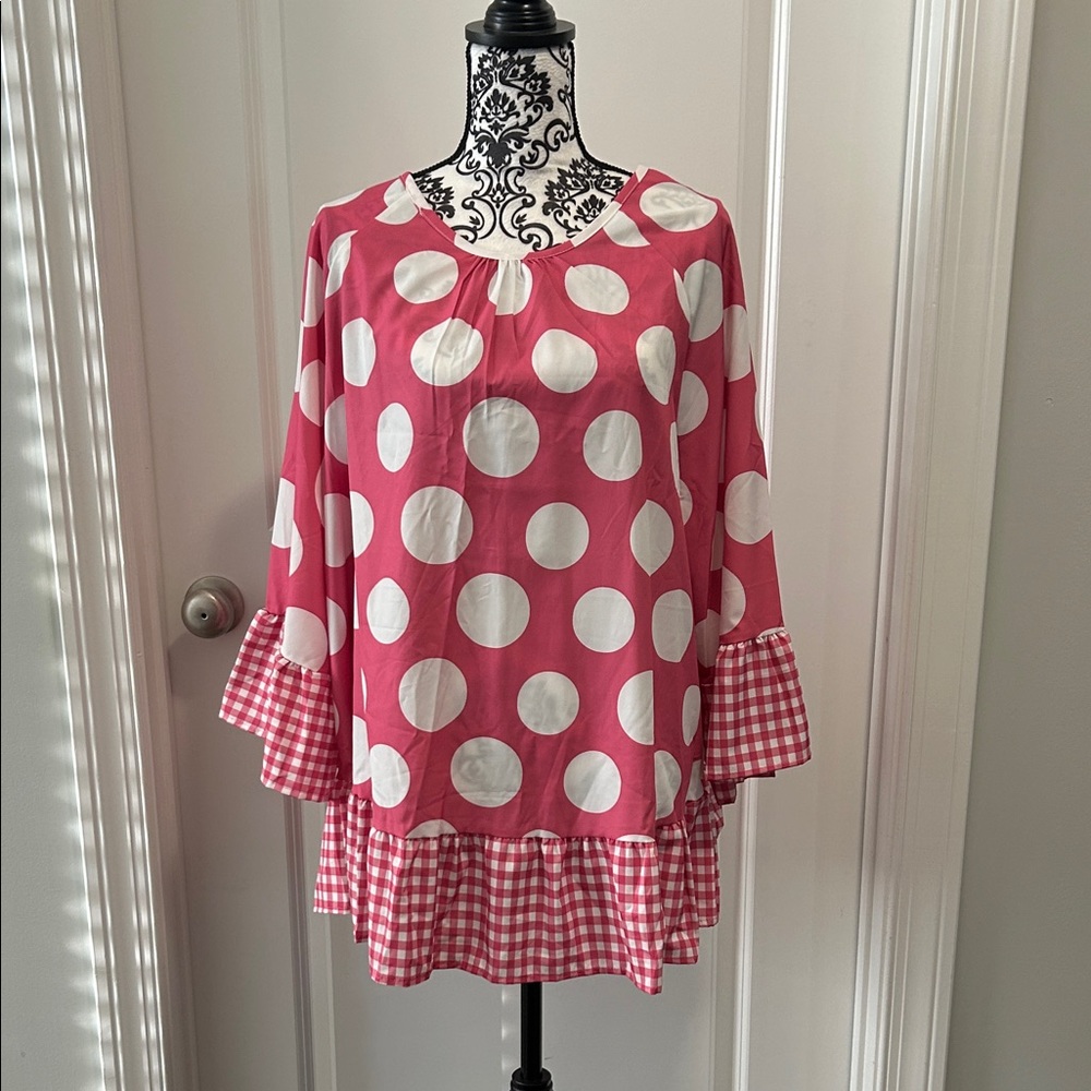 Woman’s Polka Dot Ruffle Hem Top